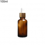 Pruun klaaspurk eeterliku &otilde;li, vedela parf&uuml;&uuml;mi, aroomiteraapia tilgutipudel