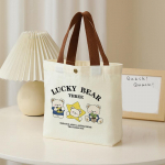 V&auml;ike mitmek&uuml;lgne k&auml;ekott, armas koomiksiga mini l&otilde;uendikott, nais&uuml;li&otilde;pilase l&otilde;unas&ouml;&ouml;gikarp, lihtne kandekott, kontorit&ouml;&ouml;taja l&otilde;unas&ouml;&ouml;gikott as the picture