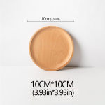 Puidust p&ouml;&ouml;gitaldrik, puuviljataldrik, ovaalsed kaubaaluste kandikud, dekoratiivsed kommid, ristk&uuml;likukujulised magustoidu &otilde;htus&ouml;&ouml;gi lauan&otilde;ude kandikud, k&ouml;&ouml;gitarvikud