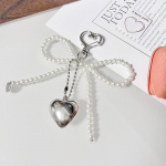 Sweet Bowknot S&uuml;damega v&otilde;tmehoidja ripats Armas helmestega rippuv kaunistused v&otilde;tmehoidja amulett Telefonipael Telefonikoti ripats valge