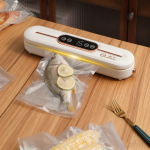 Vaakumtihendusmasin Automaatne vaakummasin Tihendus ja v&auml;rskuse s&auml;ilitamine Pakendamine Majapidamises kasutatav vaakumtihendusmasin valge