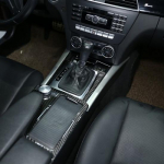 H&otilde;bedane ABS-konsooli k&auml;igukasti k&uuml;lgmine viimistlus Mercedes Benz C-klassile W204 2008-2013