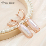 Moodne trendikas ovaalne munakujuline simuleeritud p&auml;rliga k&otilde;rvar&otilde;ngad naistele t&uuml;drukutele, pulmapeo ehted, stiilsed k&otilde;rvatropid