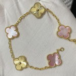 Uus versioon Neljaleheline ristik Viie &otilde;iega k&auml;ev&otilde;ru Naturaalne punane ahhaat Valge p&auml;rlmutter K&auml;ev&otilde;ru Naiste laserk&auml;ev&otilde;ru V Gold