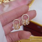 Korea moeehted 14K ehtsast kullast galvaniseeritud vasest inkrusteeritud CZ tsirkoonk&otilde;rvar&otilde;ngad elegantsed lihtsad &uuml;mmargused naiste k&otilde;rvar&otilde;ngad valge