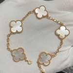 Uus versioon Neljaleheline ristik Viie &otilde;iega k&auml;ev&otilde;ru Naturaalne punane ahhaat Valge p&auml;rlmutter K&auml;ev&otilde;ru Naiste laserk&auml;ev&otilde;ru V Gold