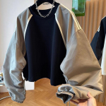 Lahtine, kontrastsete v&auml;rvidega lapiline naiste dressipluus v&ouml;&ouml;koht M must