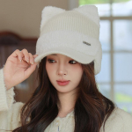 Talvine lapit&ouml;&ouml; naarits samet kassik&otilde;rvad paks j&auml;nesekarva pesapallim&uuml;ts naiste soe kootud m&uuml;ts valge