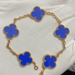 Uus versioon Neljaleheline ristik Viie &otilde;iega k&auml;ev&otilde;ru Naturaalne punane ahhaat Valge p&auml;rlmutter K&auml;ev&otilde;ru Naiste laserk&auml;ev&otilde;ru V Gold