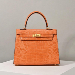 Mati tekstuuriga krokodillimustriga kott ehtsast nahast uus atmosf&auml;&auml;riline k&auml;ekott Moodne mitmek&uuml;lgne &otilde;lakott 22x7x14cm oranž