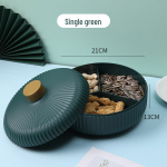 Kerge luksuslik &uuml;mmargune kaanega kuivatatud puuviljade hoiukarp kodu elutuppa kohvilauale, lihtne kommikarp, uue stiiliga puuviljavaagnariiul. roheline