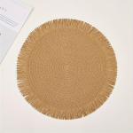 &Uuml;mmargune punutud lauamatt, boheemlaslikud s&ouml;&ouml;gilaua alused, j&otilde;uludeks m&otilde;eldud kootud pestavad libisemiskindlad alusmatid pompom-tutidega kohv