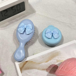 Armas multikas kikis&otilde;lme k&auml;epideme kamm peanaha massaaž reisimiseks kaasaskantav plastikust &otilde;hkpadi v&auml;ike kamm juuksehari kikilips Armas armas kamm must