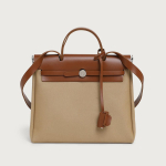 New autumn and winter fashion women's handbag, niche high-end waterproof canvas crossbody bag with button closure and flap design, Kelly bag 30*10*25 khaki