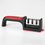 Kolm-&uuml;hes multifunktsionaalne noateritaja: K&ouml;&ouml;gikivi, peenveski ja terat&ouml;&ouml;riist k&ouml;&ouml;gis ja &auml;riliseks kasutamiseks three-stage (bag) must/punane