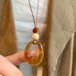 Boheemlaslik nahast ripats kaelakee ni&scaron;&scaron; retro temperamendiga rangluukett mitmek&uuml;lgne mood k&otilde;rgekvaliteediline ehtekunst