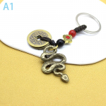 2025. aasta Hiina Zodiac Snake Lucky Ripats V&otilde;tmehoidja Loominguline rikkus V&otilde;tmehoidja Aksessuaarid Naistele Meestele Kott v&otilde;lu Ehted Kingitus