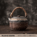 Jaapani stiilis kullatud rauast glasuuritud rotangist k&auml;epidemega teekann majapidamises kasutamiseks, veekeetja, teepruulimispott elektripliidi jaoks