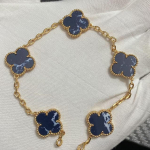 Uus versioon Neljaleheline ristik Viie &otilde;iega k&auml;ev&otilde;ru Naturaalne punane ahhaat Valge p&auml;rlmutter K&auml;ev&otilde;ru Naiste laserk&auml;ev&otilde;ru V Gold