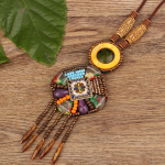 Etnilises stiilis Nepali ehted, nahast kaelakee, eksootiline disain, k&auml;sitsi kootud vintage B&ouml;&ouml;mi esemed