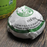 NanNuo m&auml;e Tribute Tuocha * Xiaguan Toores Puerh Tee Pu'er Pu Erh 100g Karbis