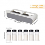 K&ouml;&ouml;k isekleepuv v&uuml;rtside organiseerimisriiul maitseainepudelite hoiureisel lauasahtlialune peidetud k&ouml;&ouml;gitarvete hoiukoht