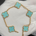 Uus versioon Neljaleheline ristik Viie &otilde;iega k&auml;ev&otilde;ru Naturaalne punane ahhaat Valge p&auml;rlmutter K&auml;ev&otilde;ru Naiste laserk&auml;ev&otilde;ru V Gold