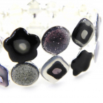 NOA [H0852] &ndash; disainerk&auml;ev&otilde;ru 'Les Acidul&eacute;s' must valge must