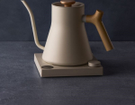 Fellow Stagg EKG PRO 900ml electric kettle in sesame beige with a wooden handle