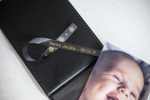 Brother TZE-R354 24mm Gold on black satin (4m)