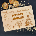 Graveeritud puidust l&otilde;ikelaud "J&otilde;ulud" Sinu valitud perekonnanimega