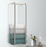 Stainless Steel Rolled Towel Holder and Organizer Ideal for Modern Small Bathrooms with Limited Space, Sleek and Chic Silver Design.