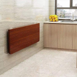 Seinale paigaldatav kokkupandav laud v&auml;ikestesse ruumidesse. Lihtne paigaldus, ei vaja puurimist. Tugev ja vastupidav. Ideaalne riietuslauale, k&ouml;&ouml;ki ja mujale (V&auml;rv: )