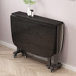 Kokkupandav puidust s&ouml;&ouml;gilaud ratastega V&auml;ljendatav liblikas disain v&auml;ikestesse ruumidesse Kompaktne disain 120 x 80 x 75 cm must