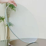 &Uuml;mmargune karastatud klaasist lauaplaat, 7mm paksus, l&auml;bim&otilde;&otilde;t 45, 55, 65, 75, 85, 100 cm, libisemisvastane padi, poleeritud servad, lauakaitseklaas &uuml;mmargustele laudadele, klaaspinnale.