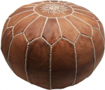 Marrakchi pouf empty made of natural leather. It is handmade in Marrakech by the best artisans of Morocco. It has a diameter of 55 cm and a height of 35 cm. Approx