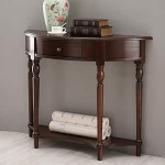 Konsoollaud T&auml;ispuidust sissep&auml;&auml;sulaua diivanilaud Poolringi taga kohvilaud Aktsentlaud sahtlitega koridorilaud fuajeesse elutuppa (pruun)