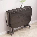 Puidust s&ouml;&ouml;gilaud, mis on pikendatav ja millel on Teardrop Leaf Space Saving Rectangular Design on Wheels Compact Folding Table for Small Kitchens and Limited Spaces (kompaktne kokkupandav laud v&auml;ikestesse k&ouml;&ouml;kidesse ja piiratud ruumidesse).