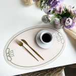 AMDXD Boho ovaalsed lauamattid, 6 tk, PU nahast j&otilde;uluplatsemadikud, pestavad, vibus&otilde;lmedega, libisemisvastased, lauaalused, naturaalne heleroheline, koju, restorani, s&ouml;&ouml;gilauale, 30 x 45 cm.