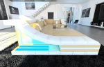 Sofa Dreams Wohnlandschaft Turino U-kujuline nahast diivan LED-valgustusega, reguleeritavad peatuged, Chaise Longue / nahav&auml;rvide valik / orientatsioon valitav (Ottomani vasakpoolne, liivapunane/valge)