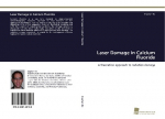 Laser Damage in Calcium Fluoride: A theoretical approach to radiation damage