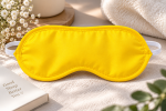 Kollane unemask kahe elastse rihmaga