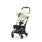 Cybex Coya jalutusk&auml;ru kreemikasvalge, mattmusta raam