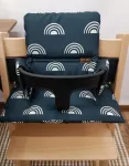 Stokke Tripp Trapp veekindlad kaitsepadjad 2in1, mustad vikerkaare mustriga