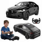 Kaugs&uuml;steemiga BMW X6 M 1:14 must auto LED-valgustusega