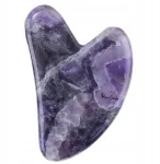 Gua Sha kivist n&auml;omassaažija