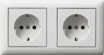 GIRA 479304 SCHUKO 2-kohaline eeljuhtmestatud pistikupesa koos raamiga, puhtvalge